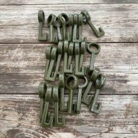 Крючок на трубку для шпажек